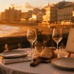 Restaurants hotel du palais biarritz : table vue mer au coucher du soleil